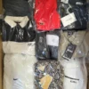 The photo shows a package with clothing in the category B.