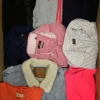 The photo shows a package with clothing in the category U.