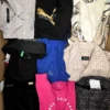 The photo shows a package with clothing in the category U.