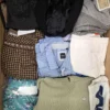 The photo shows a package with clothing in the category U.