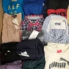 The photo shows a package with clothing in the category U.