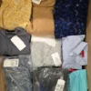 The photo shows a package with clothing in the category U.