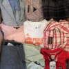 The photo shows a package with clothing in the category U.