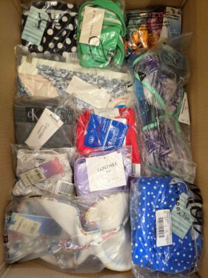 The photo shows a package with clothing in the category ABW.