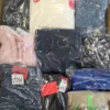 The photo shows a package with clothing in the category C.