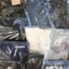 The photo shows a package with clothing in the category C.
