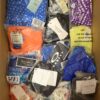 The photo shows a package with clothing in the category ABW.