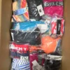 The photo shows a package with clothing in the category ABW.
