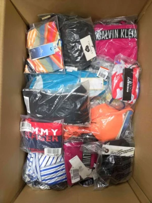 The photo shows a package with clothing in the category ABW.