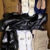 The photo shows a package with clothing in the category BPS.