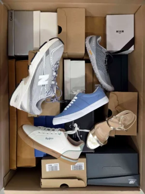 The photo shows a package with footwear in the category BS.