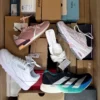The photo shows a package with footwear in the category BS.