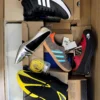 The photo shows a package with footwear in the category BS.