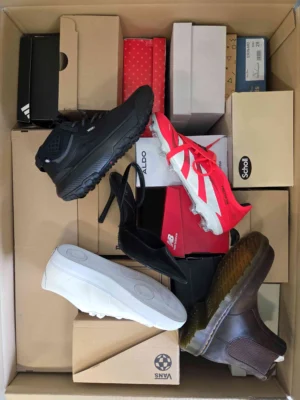The photo shows a package with footwear in the category BS.