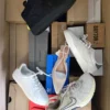 The photo shows a package with footwear in the category BS.