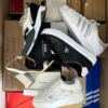 The photo shows a package with footwear in the category BS.