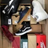 The photo shows a package with footwear in the category BS.
