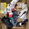 The photo shows a package with footwear in the category BS.