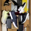 The photo shows a package with footwear in the category BS.