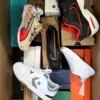 The photo shows a package with footwear in the category BS.