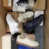 The photo shows a package with footwear in the category BS.