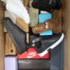 The photo shows a package with footwear in the category BS.