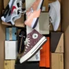The photo shows a package with footwear in the category BS.