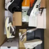 The photo shows a package with footwear in the category BS.