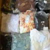 The photo shows a package with clothing in the category B.