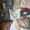The photo shows a package with clothing in the category B.