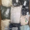 The photo shows a package with clothing in the category B.