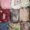 The photo shows a package with clothing in the category B.