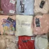 GB375 1 The photo shows a package with clothing in the category B.