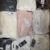 GB376 1 The photo shows a package with clothing in the category B.
