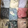 The photo shows a package with clothing in the category B.