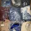 The photo shows a package with clothing in the category B.