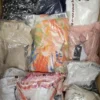 The photo shows a package with clothing in the category B.