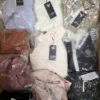 The photo shows a package with clothing in the category B.