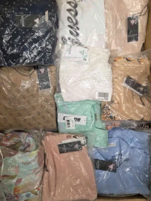 The photo shows a package with clothing in the category B.