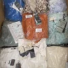 GB392 1 The photo shows a package with clothing in the category B.