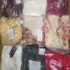 GB394 1 The photo shows a package with clothing in the category B.