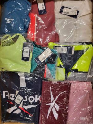 The photo shows a package with clothing in the category R.