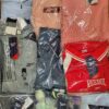 The photo shows a package with clothing in the category R.