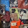 The photo shows a package with clothing in the category R.