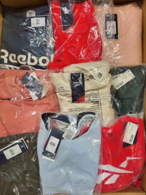 The photo shows a package with clothing in the category R.