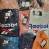 The photo shows a package with clothing in the category R.