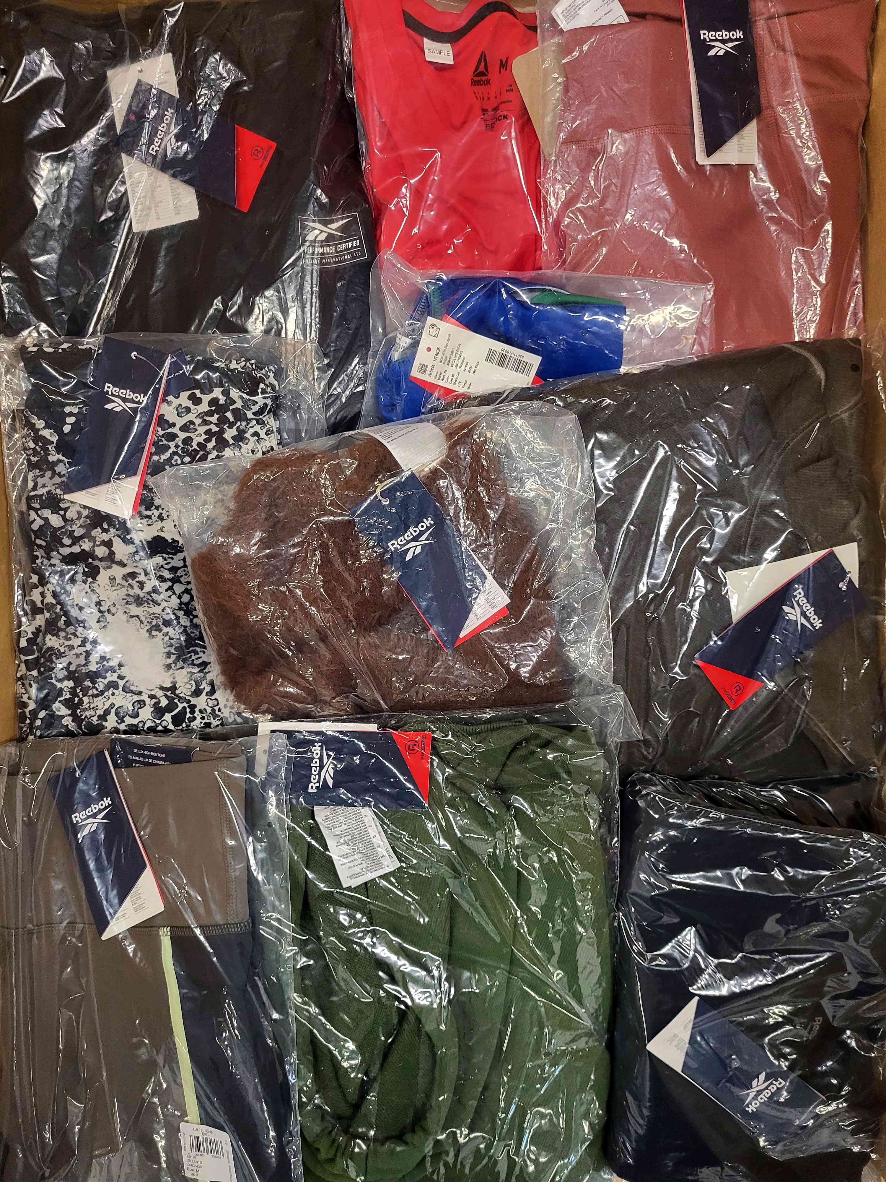 R445 3 The photo shows a package with clothing in the category R.