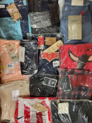 The photo shows a package with clothing in the category K.