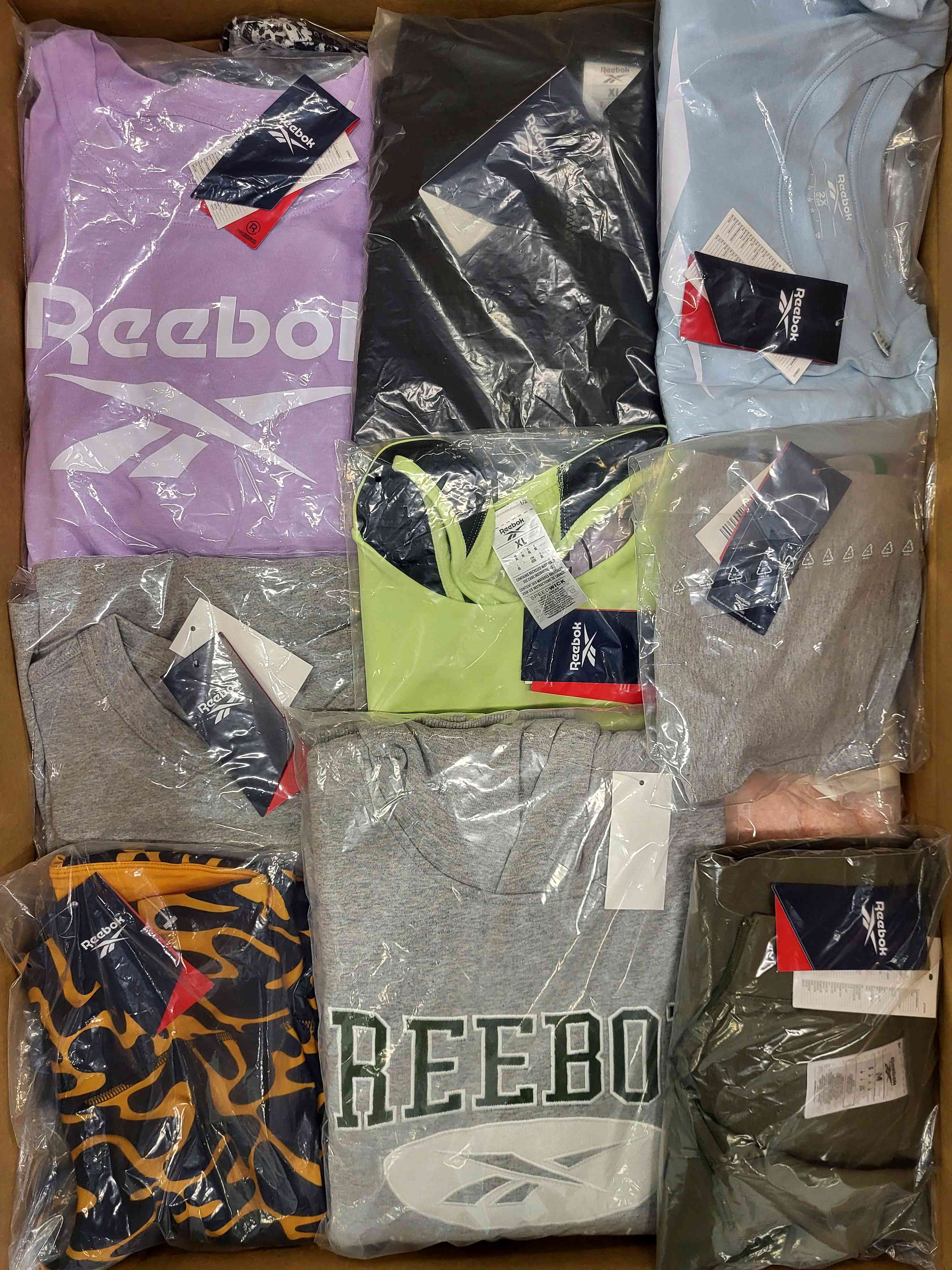R448 3 The photo shows a package with clothing in the category R.