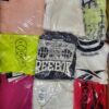 The photo shows a package with clothing in the category R.
